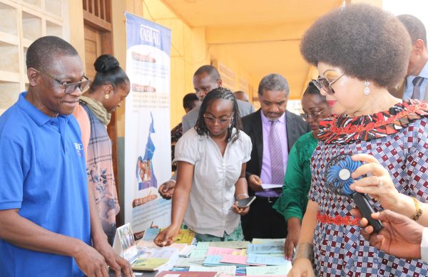 The Secretary of State to the Minister of Basic Education, Asheri Kilo, visits our stand during the International Mother Tongue Day
