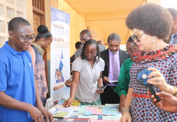 The Secretary of State to the Minister of Basic Education, Asheri Kilo, visits our stand during the International Mother Tongue Day