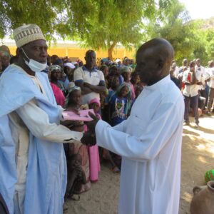 A-copy-of-the-book-of-Luke-handed-to-the-traditional-ruler-scaled-1
